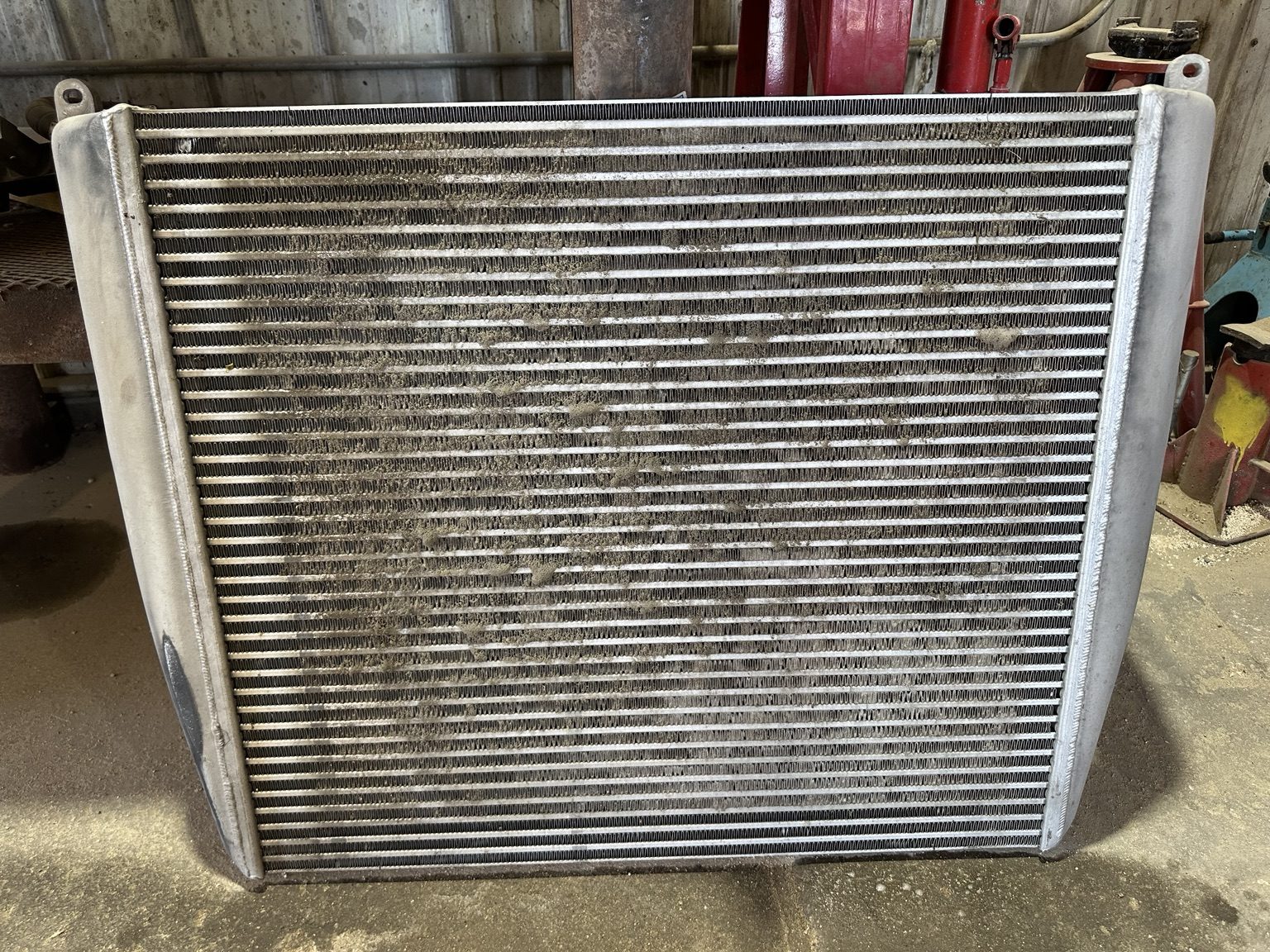 Plugged heavy-duty truck cooling pack fins restricting airflow in Blair Nebraska