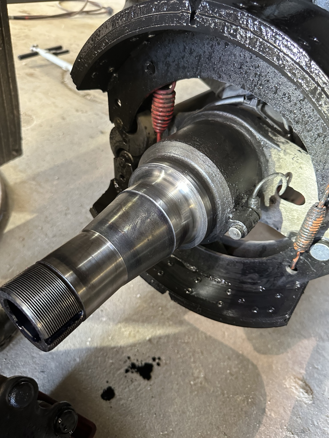 STS Truck Services technician repairing heavy-duty trailer wheel end in Blair Nebraska